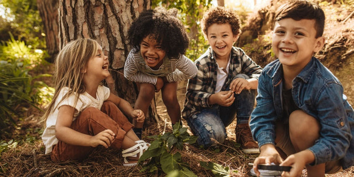 a group of children playing in the garden