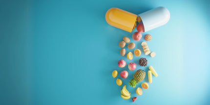 a large capsule that is open, revealing an assortment of miniature fruits spilling out against a vibrant blue background