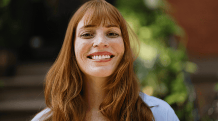 Smiling woman outdoors